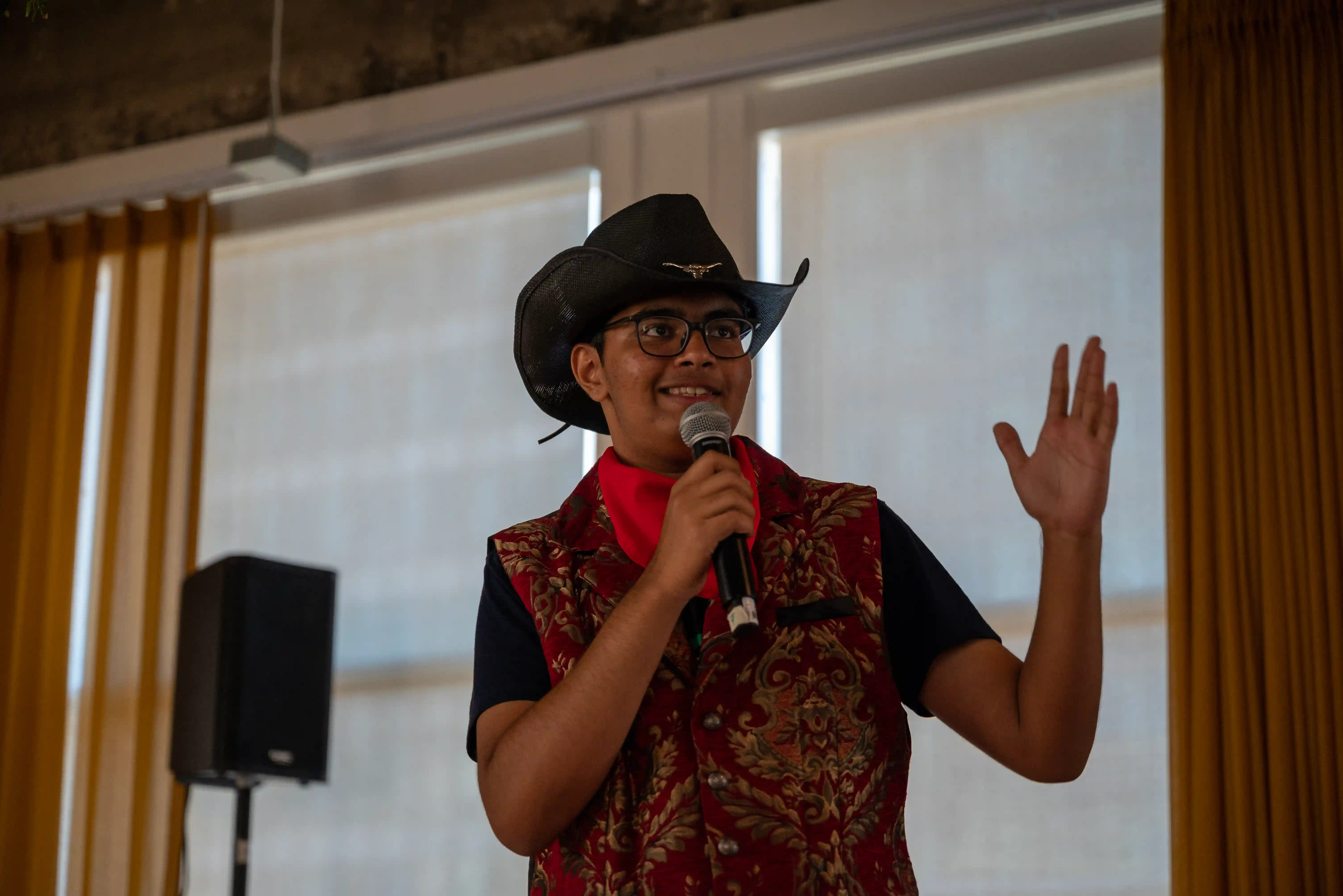 Man speaking into microphone
